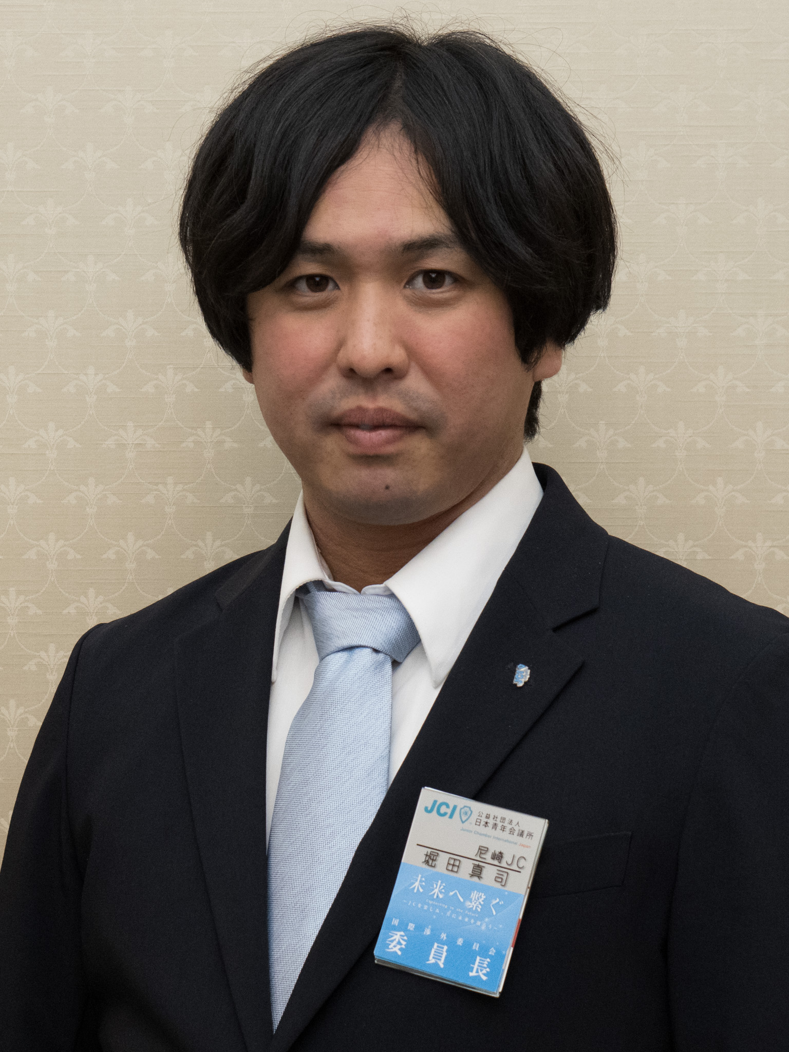 国際渉外委員会 委員長 堀田 真司